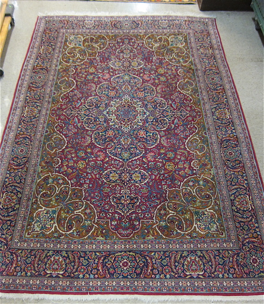 Appraisal: HAND KNOTTED ORIENTAL AREA RUG Persian floral and central floral