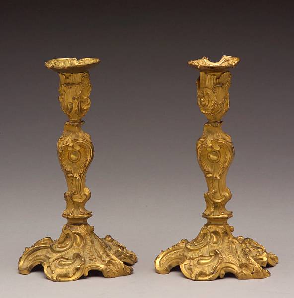 Appraisal: A pair of Rococo style gilt bronze candlesticks second half