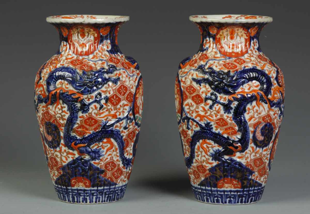 Appraisal: Pair of Imari Vases Relief dragons fluted sides Exc Ht