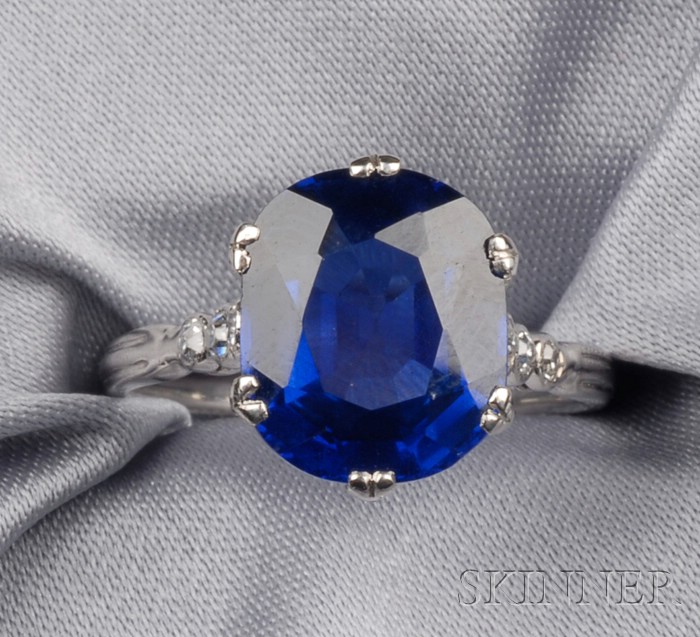 Appraisal: Platinum Burma Sapphire and Diamond Ring c prong-set with a