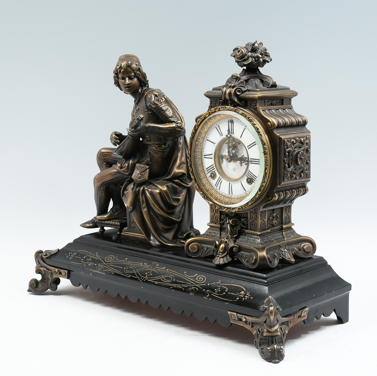 Appraisal: FIGURAL ANSONIA MANTLE CLOCK Patinated spelter mantle clock Mandolin player