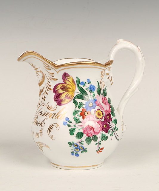 Appraisal: A STAFFORDSHIRE PORCELAIN JUG with painted flower decoration and inscribed