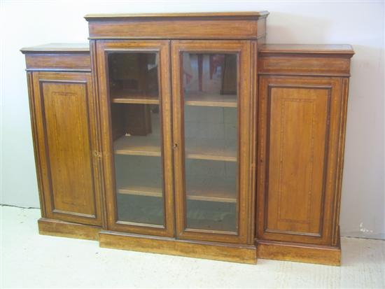 Appraisal: th century mahogany boxwood and ebony strung crossbanded breakfront bookcase