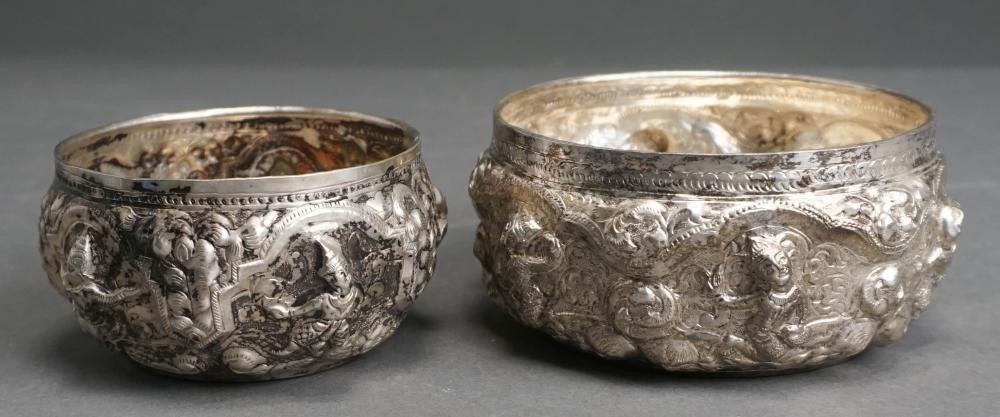 Appraisal: TWO PROBABLY BURMESE TESTED LOW-PURITY SILVER FIGURAL EMBOSSED BOWLS D