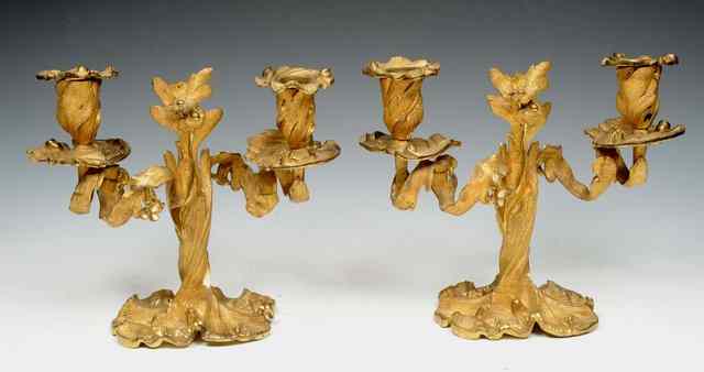 Appraisal: A PAIR OF ORMOLU ROCOCO STYLE TWO BRANCH CANDELABRUM of