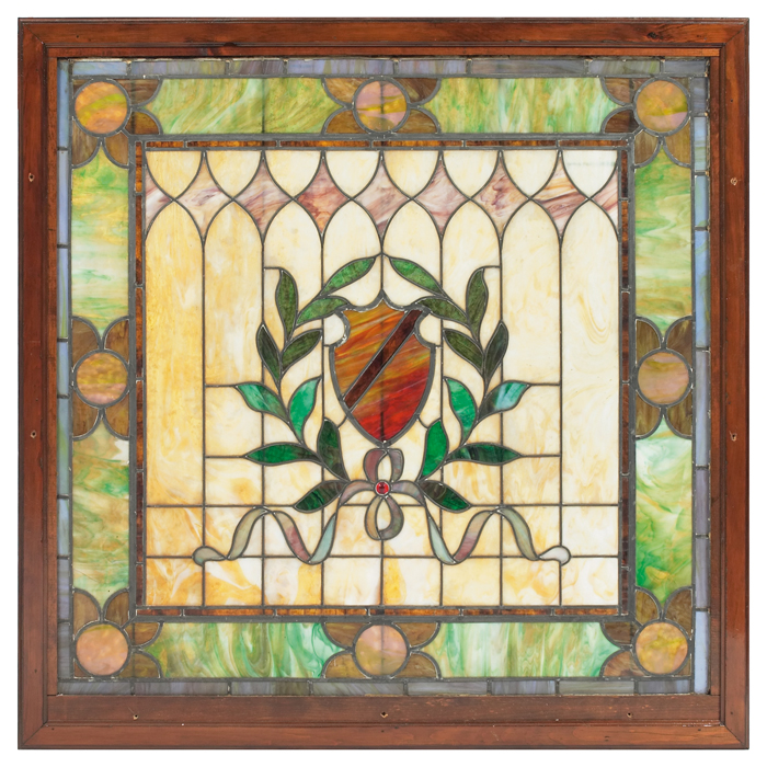 Appraisal: Arts Crafts window in leaded glass with floral and shield