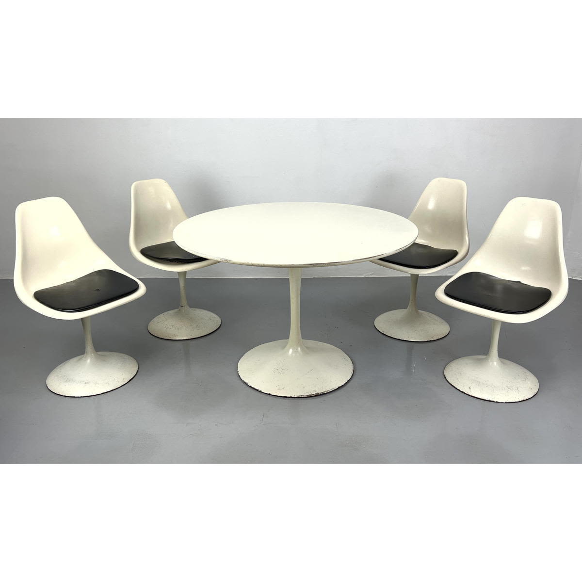 Appraisal: pc Burke style Tulip Dining Set Round White Laminate Top