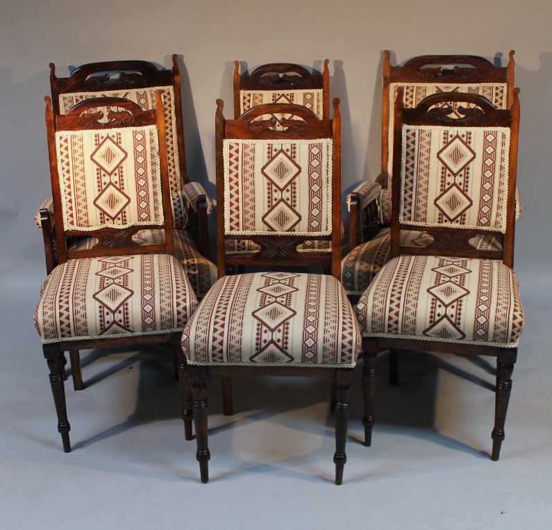 Appraisal: A salon suite comprising a pair of large armchairs and