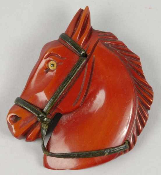 Appraisal: Bakelite Brown Horse with Glass Eye Pin Condition Excellent Size