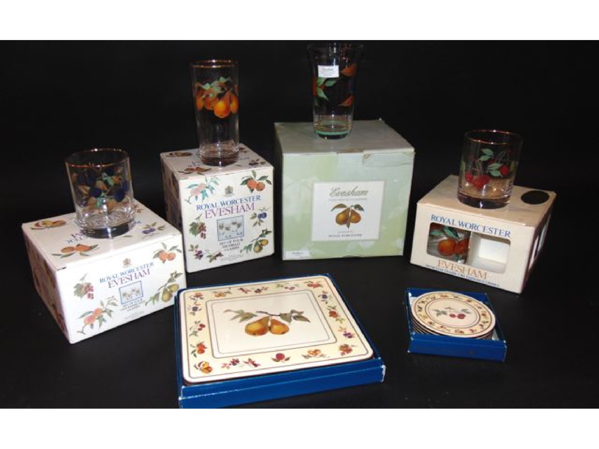 Appraisal: A selection of boxed Evesham pattern hand painted glass wares