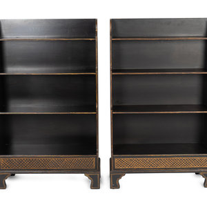 Appraisal: A Pair of Regency Style Ebonized and Gilt Waterfall Book