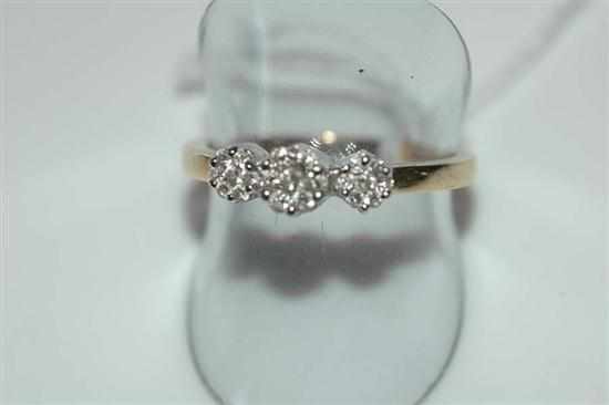 Appraisal: A DIAMOND CLUSTER RING STAMPED CT GOLD