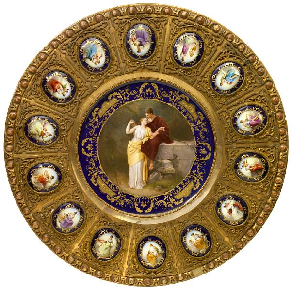 Appraisal: A large German porcelain and gilt bronze mounted giltwood plaque