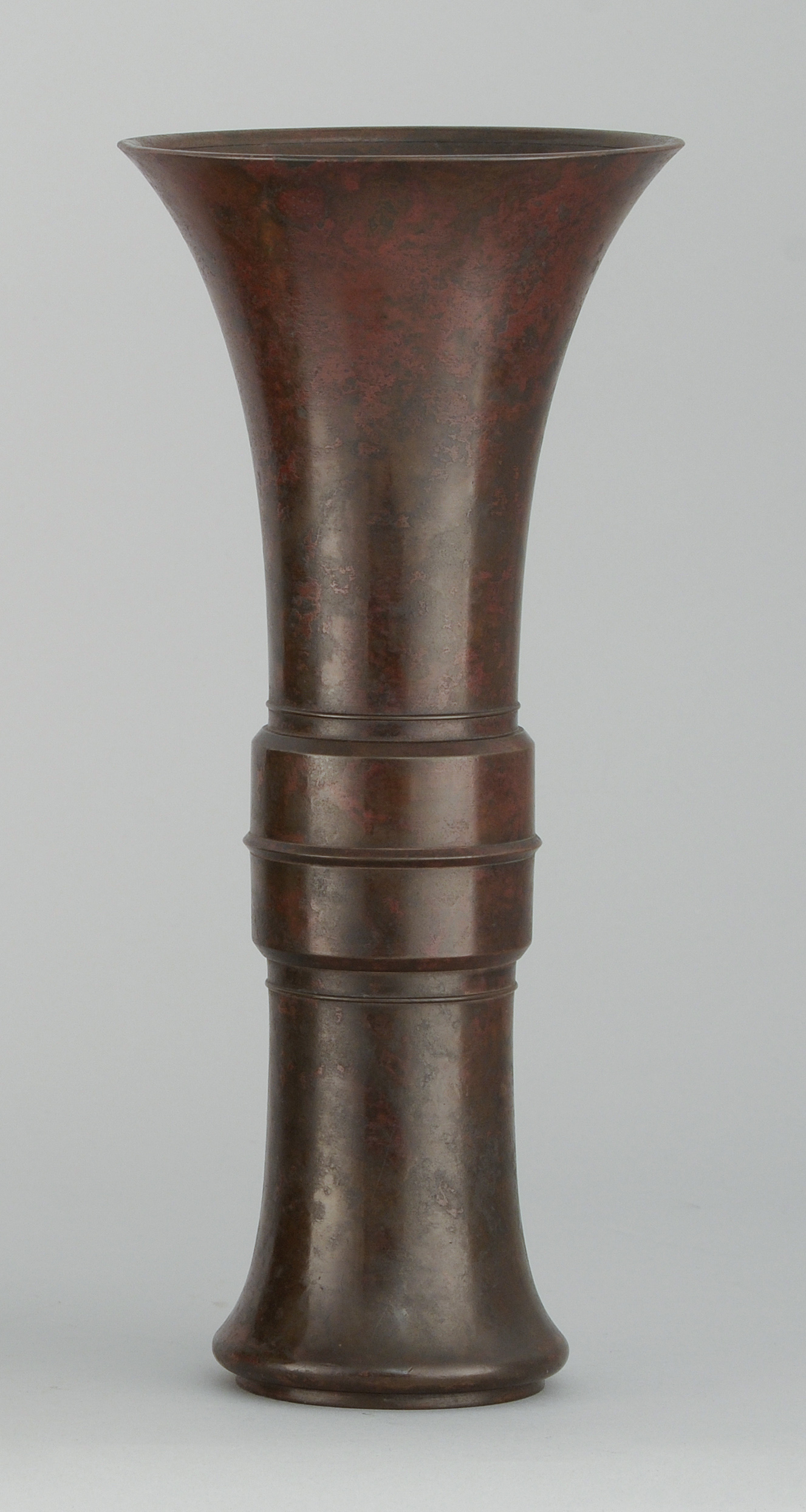 Appraisal: BRONZE VASE Meiji PeriodIn trumpet form with red-brown patination Two-character