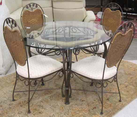 Appraisal: CONTEMPORARY IRON AND WICKER DINING TABLE AND CHAIR SET including