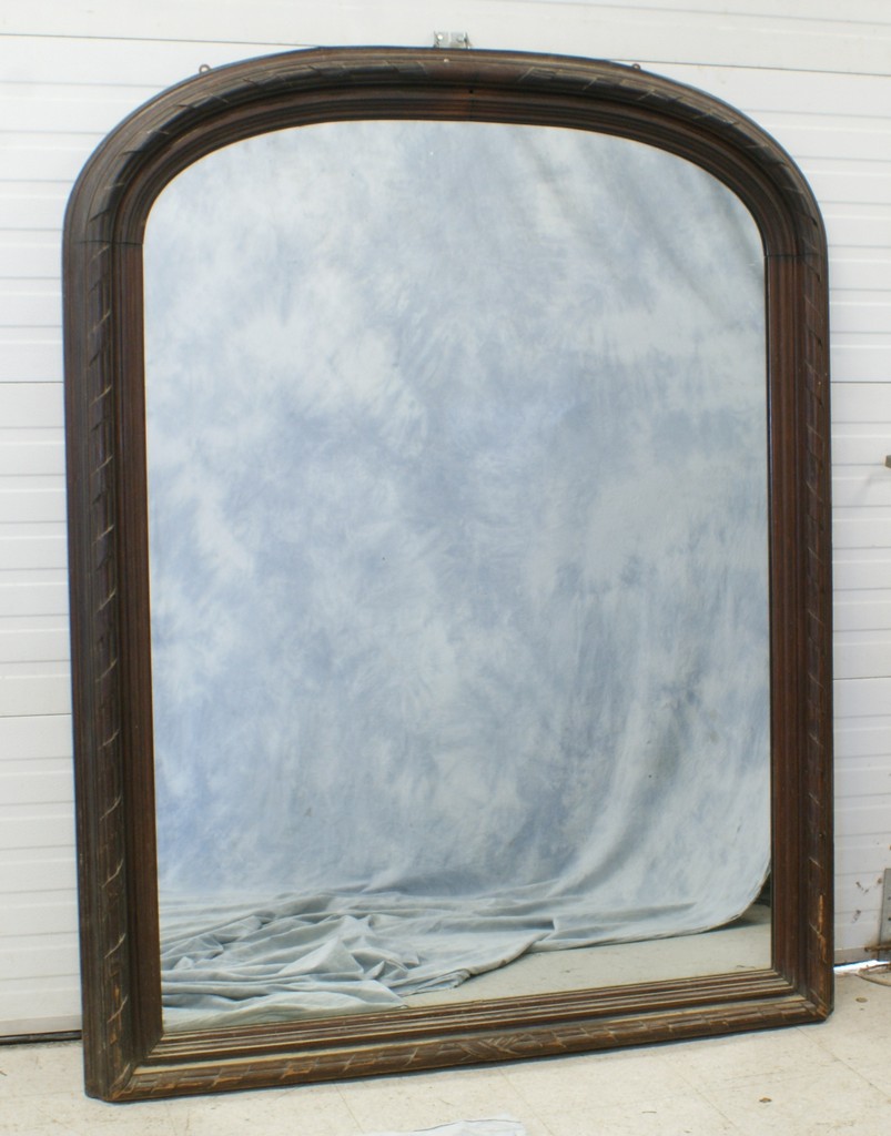 Appraisal: Walnut Victorian over-mantle mirror with a heavily molded and carved