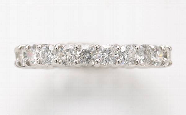 Appraisal: A diamond and k white gold eternity band estimated total