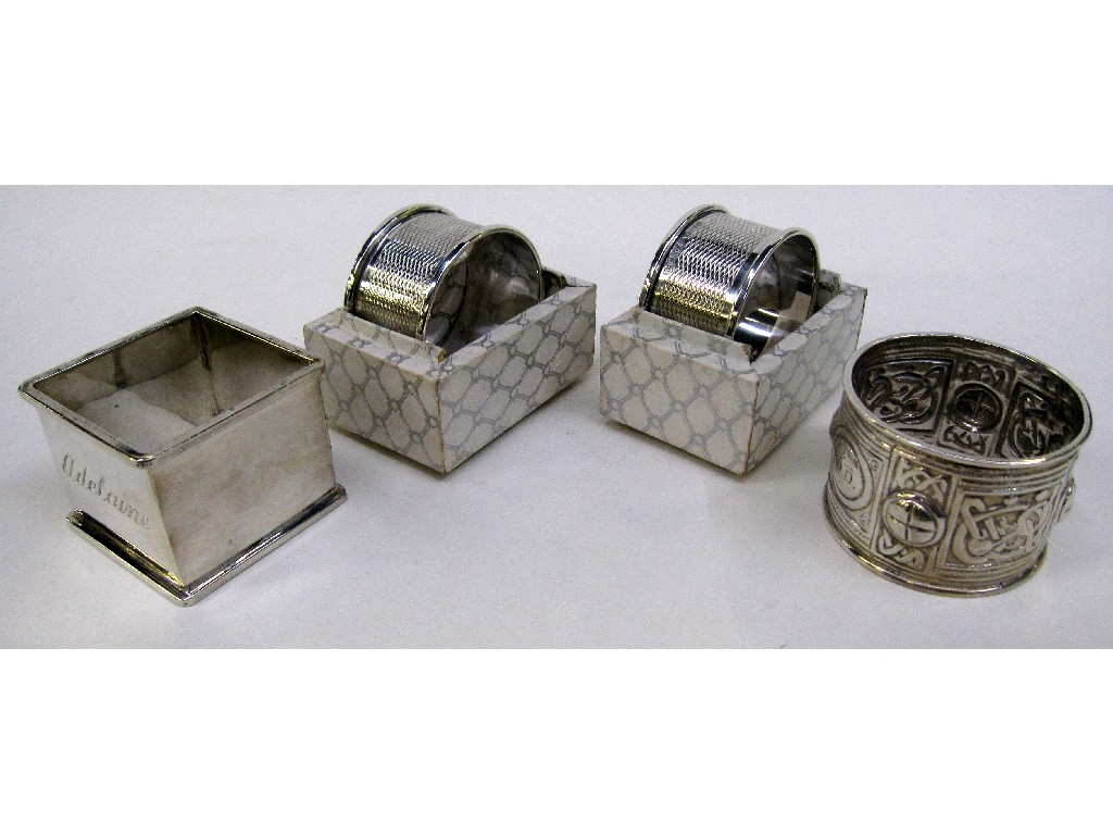 Appraisal: Lot comprising pair of silver napkin rings Birmingham and one