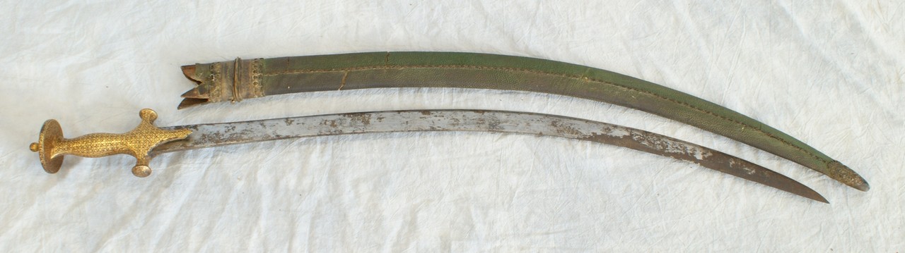 Appraisal: Indian Tulwar sword in original green skin scabbard original fittings