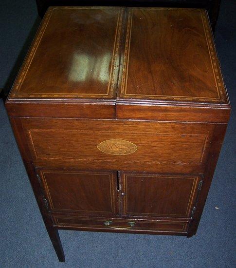 Appraisal: A George III style dressing table the feather banded folding