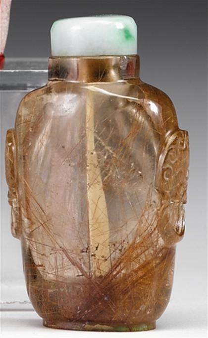 Appraisal: Chinese 'golden hair' crystal snuff bottle th century Of slender