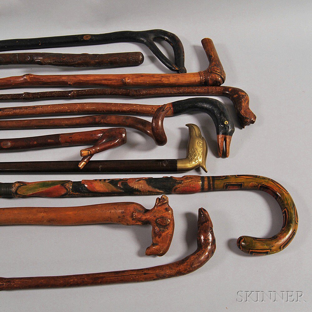 Appraisal: Eleven Mostly Carved Walking Sticks including one with paint decoration