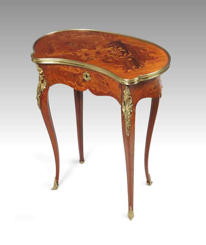 Appraisal: FRENCH STYLE ORMOLU MOUNTED SIDE TABLE Shaped top floral motif