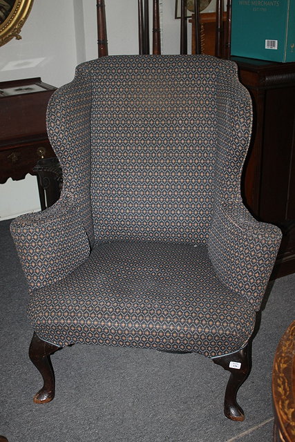 Appraisal: AN TH CENTURY MAHOGANY FRAMED LARGE WINGBACK ARMCHAIR