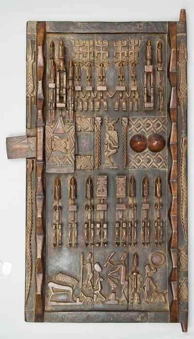 Appraisal: A Dogon door Mali second half th century with raised