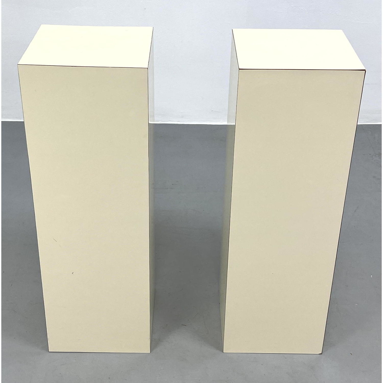 Appraisal: Pair Cream Laminate Pedestal Display Stands Dimensions H inches W