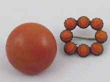 Appraisal: A large cabochon coral brooch approx mm in diameter together