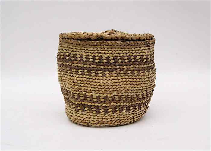 Appraisal: SOUTH PUGET SOUND NISQUALLY INDIAN COVERED BASKET cylindrical with darker