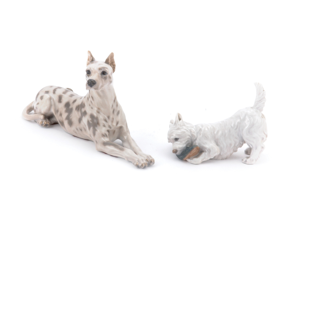 Appraisal: Two Royal Copenhagen Porcelain Figures of Dogs Length of larger