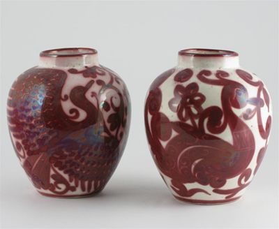 Appraisal: A pair of Cantagalli ruby flambe glazed vases each painted