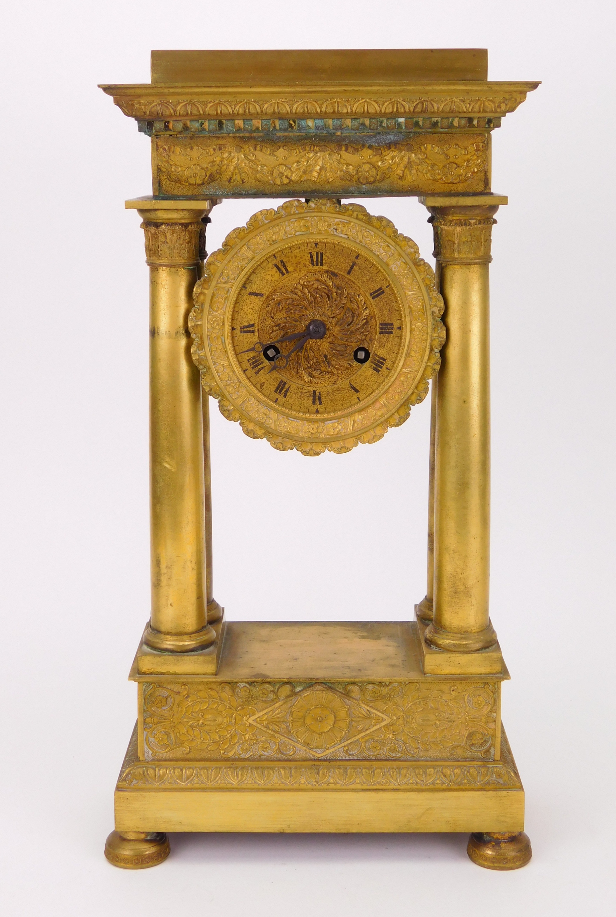 Appraisal: French Empire column clock day time and strike brass case