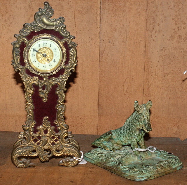 Appraisal: A FRENCH MINIATURE COMPTOISE MANTEL CLOCK with white enamel dial