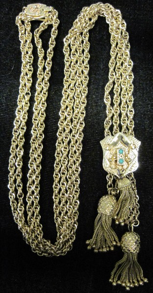 Appraisal: karat yellow gold lavalierAccented by turquoise double link chain ending