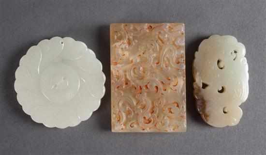 Appraisal: Three Chinese carved jade or hardstone pendants th century comprising