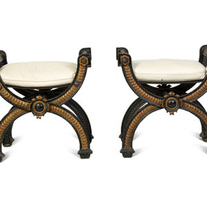 Appraisal: A Pair of Continental Cast Iron and Parcel Gilt Curule-form