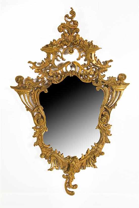 Appraisal: Rococo style gilt cast-brass mirror early th century Rococo scrolls