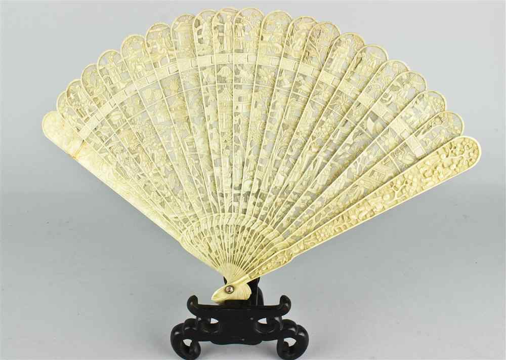 Appraisal: TWO CHINESE EXPORT CARVED IVORY FANS CIRCA the first the