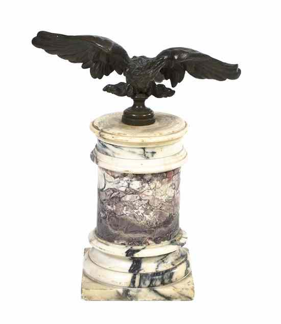 Appraisal: A Patinated Bronze and Marble Ornament cast as a spread