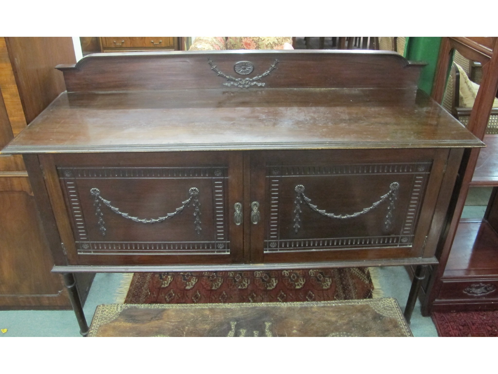 Appraisal: Carved mahogany sideboard