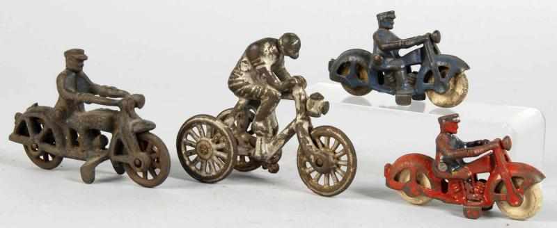 Appraisal: Lot of Cast Iron Cycle Toys Description American Includes three