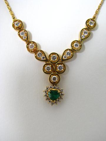 Appraisal: K yellow gold emerald and diamond necklace with heart shaped