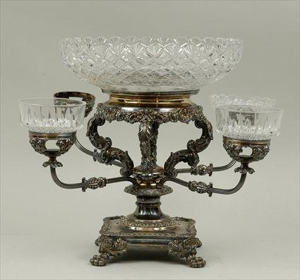 Appraisal: English Victorian Silverplate and Cut Glass Epergne Missing three dishes