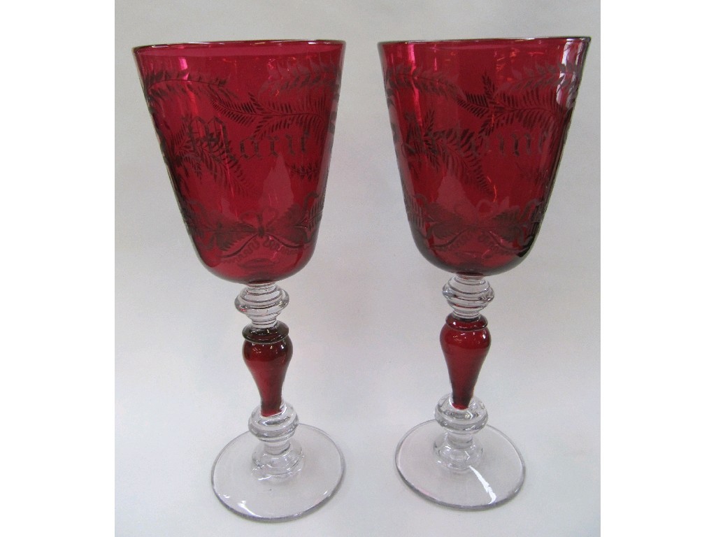 Appraisal: Pair of late th early th century cranberry glass marriage