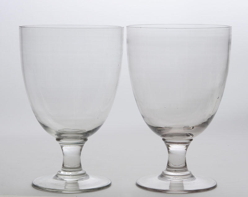 Appraisal: PAIR OF BLOWN-GLASS LARGE GOBLETS Each bowl on beaker stem