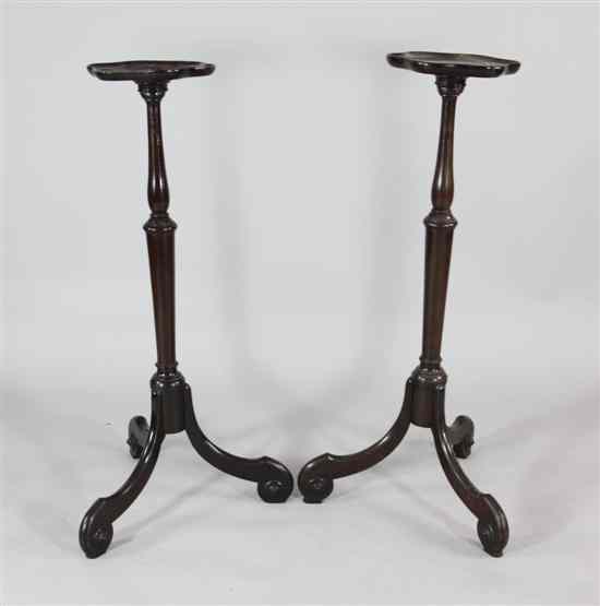 Appraisal: A pair of George II style mahogany tripod torcheres ft