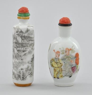 Appraisal: Two Porcelain Snuff Bottles With carved stoppers squat form with